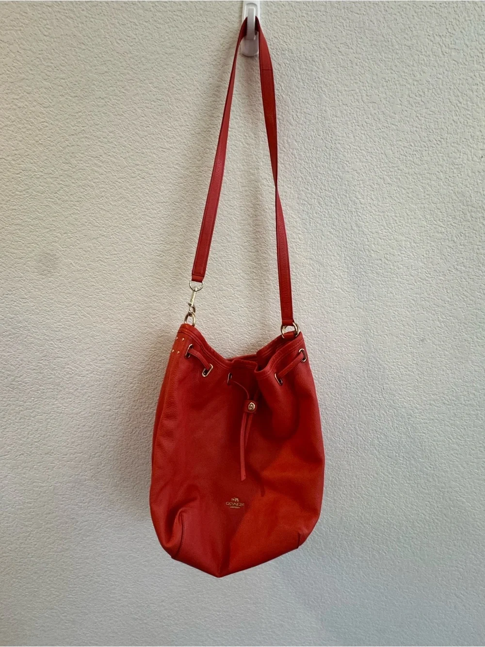Coach Twist Lock Coral-Orange Pebbled Leather Drawstring Shoulder Bag